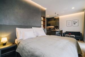 Posteľ alebo postele v izbe v ubytovaní Executive Apartments Taborska