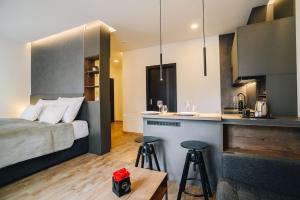 Posteľ alebo postele v izbe v ubytovaní Executive Apartments Taborska