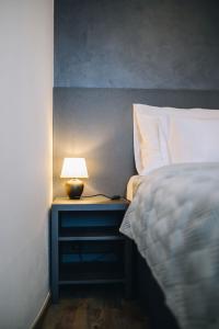 Posteľ alebo postele v izbe v ubytovaní Executive Apartments Taborska