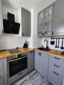 Kuchyň nebo kuchyňský kout v ubytování Nika Apartments
