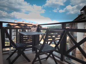 A balcony or terrace at ParkView Complex Large Flat Next to Ski Lift
