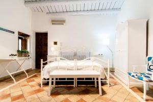 Letto o letti in una camera di A 50 passi dal Tempio di Apollo