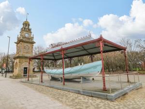 a boat in a pavilion in front of a clock tower at 16 Seafield Terrace in South Shields