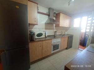 Kuchyň nebo kuchyňský kout v ubytování Casa Santiago de la Ribera
