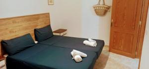 Postel nebo postele na pokoji v ubytování ca sa tia