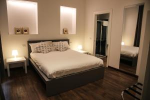 A bed or beds in a room at 7 Seven