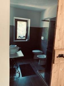 Koupelna v ubytování Cà del Prete country room by Cà degli Ovi