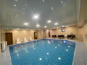 בריכת השחייה שנמצאת ב-Hotel - Saya או באזור