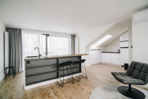 Posedenie v ubytovaní Executive Apartments Taborska