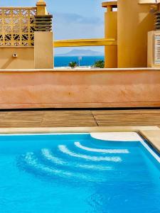 The swimming pool at or close to Rooftop Pool Apartment Corralejo