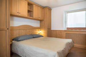 Posteľ alebo postele v izbe v ubytovaní Casa Rododendro - Cavalese Dolomites