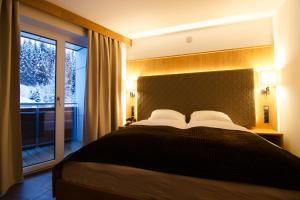 Postel nebo postele na pokoji v ubytování Hotel Victoria - adults only