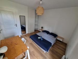 Posteľ alebo postele v izbe v ubytovaní Appartement 2 pièces de Charme à d'Annemasse.