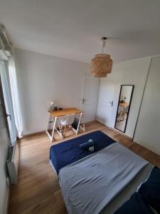 Posteľ alebo postele v izbe v ubytovaní Appartement 2 pièces de Charme à d'Annemasse.