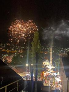 a fireworks display in a city at night at Miss Saray in Sarajevo