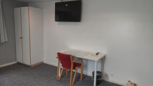 TV a/nebo společenská místnost v ubytování Ringslund B&B + 11 fotografií
