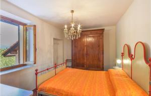 Posteľ alebo postele v izbe v ubytovaní 4 Bedroom Beautiful Home In Tiglieto