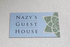 תעודה, פרס, שלט או מסמך אחר המוצג ב-Nazy's Guest House