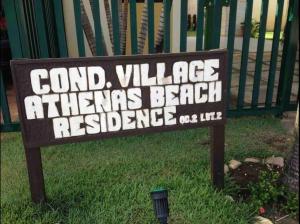 a sign that reads cord village athens beach residence at Beira Mar Salvador Bahia Brazil climatizado in Salvador