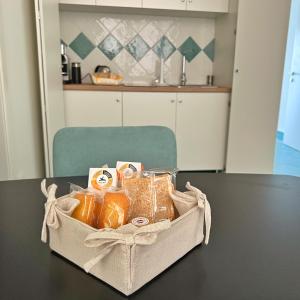 a basket of bread on a table in a kitchen at Casa Adelaide in Capri