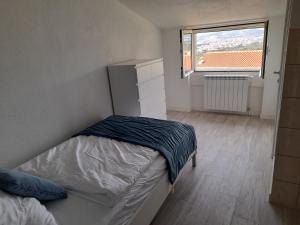 Letto o letti in una camera di The View Split. Highlight with Roof-Top-Terrace and Pool