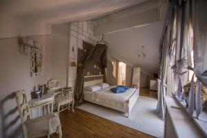 Postel nebo postele na pokoji v ubytování Guesthouse Trajbar Team + 37 fotografií
