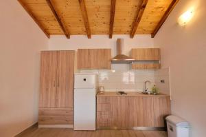 Kuchyňa alebo kuchynka v ubytovaní Luxury Villa Poquito