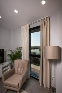 Posedenie v ubytovaní Apartamentos Ribera 19