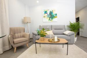 Posedenie v ubytovaní Apartamentos Ribera 19