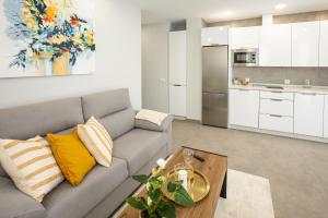 Kuchyňa alebo kuchynka v ubytovaní Apartamentos Ribera 19