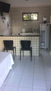 מטבח או מטבחון ב-Flat do Golfinho