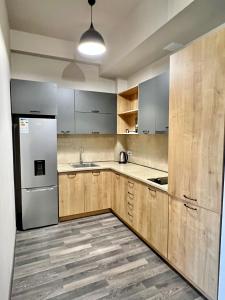 Η κουζίνα ή μικρή κουζίνα στο Toon Kechi with balcony