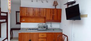 Køkken eller tekøkken på Hotel Piedra del Mar