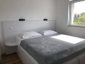 Postel nebo postele na pokoji v ubytování Apartament Maja