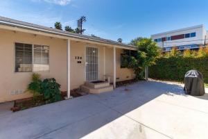 a house with the number on the front of it at 3 bedroom Mid-Wilshire Charmer near Downtown in Los Angeles