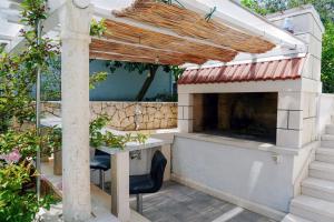 Vonkajšia záhrada v ubytovaní Studio Lumbarda 9325a