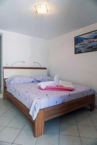 Posteľ alebo postele v izbe v ubytovaní Studio Lumbarda 9325a