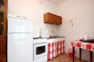 Kuchyň nebo kuchyňský kout v ubytování Apartments by the sea Podstrana, Split - 9412