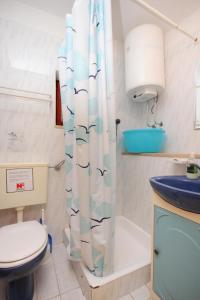 Koupelna v ubytování Apartments by the sea Karbuni, Korcula - 9308 + 36 fotografií