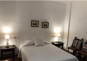 Postel nebo postele na pokoji v ubytování Casa Pepe La Rosa