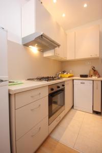 Kuchyň nebo kuchyňský kout v ubytování Apartment Dinjiska 9386a + 15 fotografií
