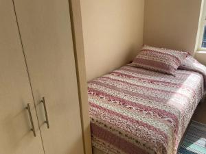 Postel nebo postele na pokoji v ubytování Departamento Chillan céntrico