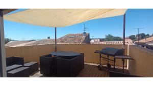 Balkón alebo terasa v ubytovaní Maison terrasse barbecue à 1 tram de Montpellier et 20 min des plages