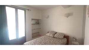 Posteľ alebo postele v izbe v ubytovaní Maison terrasse barbecue à 1 tram de Montpellier et 20 min des plages