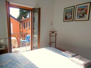 Posteľ alebo postele v izbe v ubytovaní B&B della Contrada Varenna