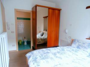 Posteľ alebo postele v izbe v ubytovaní B&B della Contrada Varenna