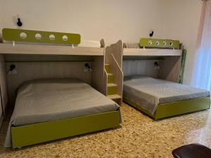 Postel nebo postele na pokoji v ubytování CASA VACANZE REFUGIUM & LOUNGE Ferienwohnung