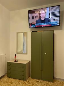 TV a/nebo společenská místnost v ubytování CASA VACANZE REFUGIUM & LOUNGE Ferienwohnung