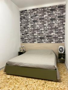 Postel nebo postele na pokoji v ubytování CASA VACANZE REFUGIUM & LOUNGE Ferienwohnung + 37 fotografií