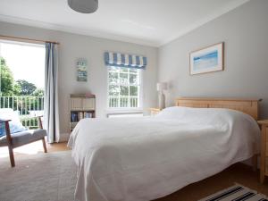 En eller flere senge i et værelse på Lowenna Manor 4